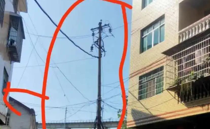 大门口对电线杆风水影响，如何化解